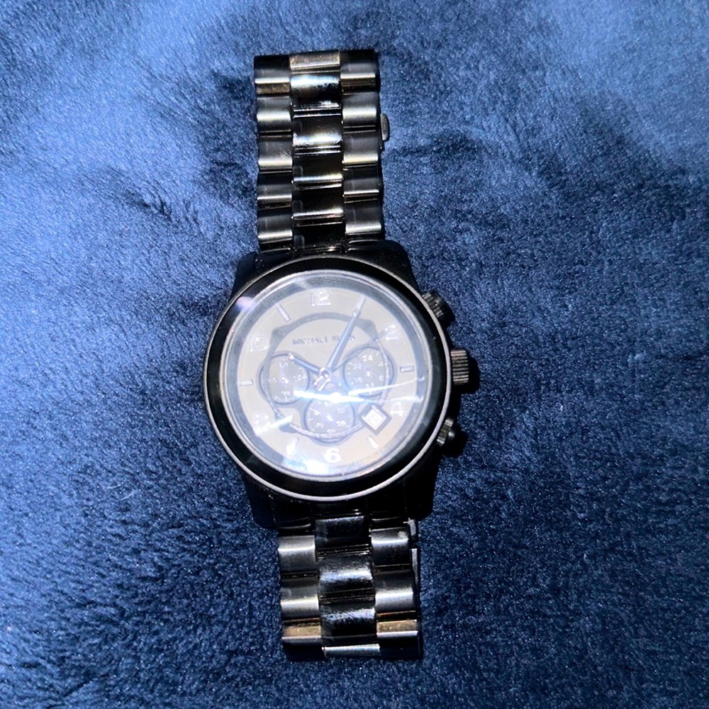 Michael Kors watch - all black, large face- must have. Worn 1x - unisex